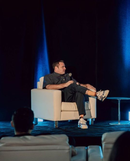 Host on stage at a past event
