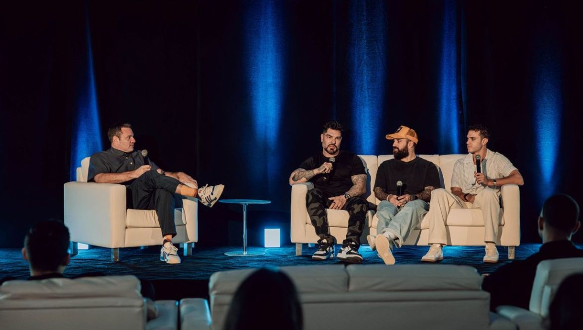 Panel of telehealth founders on stage at a past event